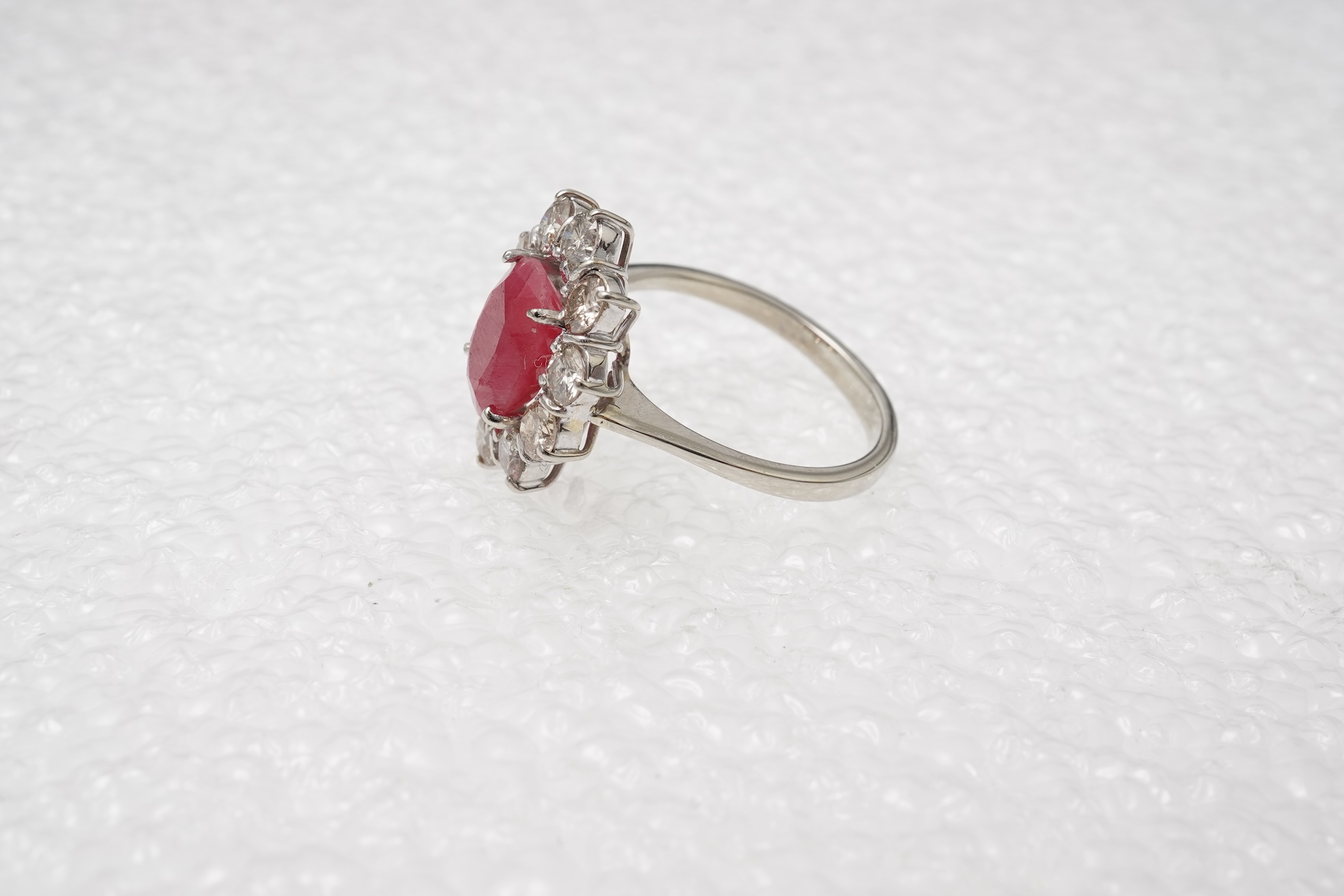 A ruby and diamond cluster ring
